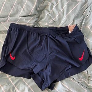 Nike men’s Dark Blue 2in Aeroswift Shorts with Red Swoosh size XL